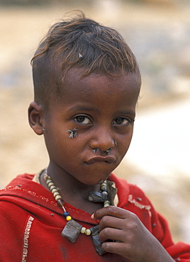 Ethiopia boy of mekelle, tigray, waiting at distribution centre