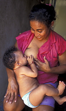 Dominican republic woman breast-feeding, el vigiador.