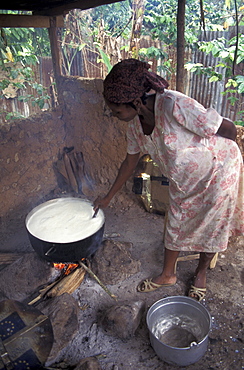 Haiti women preparing at day centre, pleche