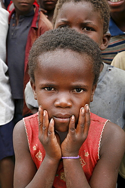 Namibia a feeding centre hungry children in rundu. Most of these children aids orphans, or positive themselves, or both. A catholic church organization provides them with a daily meal, perhaps only decent food they. hunger is evident in their eyes expressions