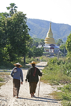 Myanmar stupa women walking, mingun, near mandalay 