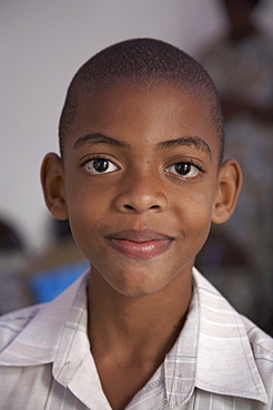 Jamaica. Boy at sunday mass at catholic church in chester castle