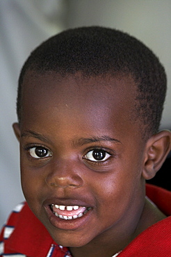 Jamaica. Boy at sunday mass at catholic church in chester castle