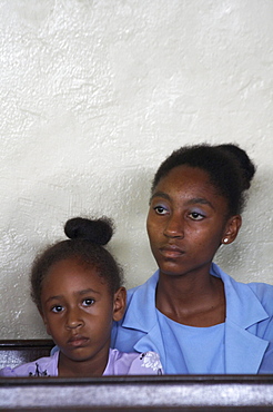 Jamaica. Faces at sunday mass in the catholic church at seaford town