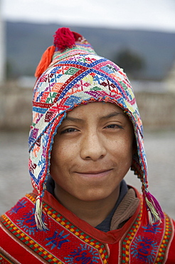 Peru. Boy in traditional dress, yanque, colca canyon