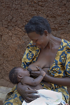 Uganda at the home of nakabugo betty, kisoga village, kayunga district. breast feeding her baby. kayunga district