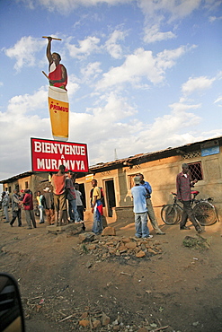 Burundi beer advert in a village of gitera.