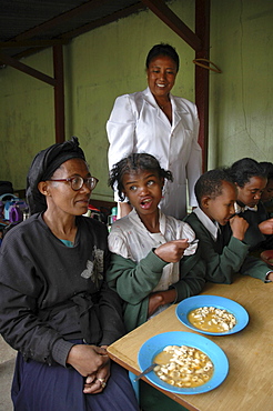 Food, ethiopia. Saint maryâˆšÂ¢Â¬Ã„Â¬Ã´s catholic school, addis ababa. A mainstream elementary and secondary school, it has a small wing for special needs children, which is featured here. Betty and her mother feleku (on left) who helps with preparing food at the center. Other parents participate in rotation