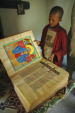 Religion, ethiopia. Temple of yeha, c5th bc. Boy and priests showing off manuscripts at the small yeha museum