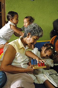 Colombia grandmother and child at a day care and child stimulation center run by dni (international defence of children) in barrancabermeja