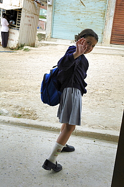 Colombia marly juliet, 7, of the slum of altos de cazuca, bogota, heading off to school