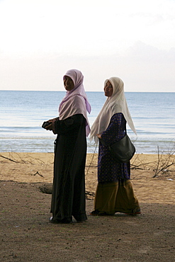 Thailand muslim girls on the beach at songkla