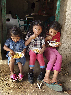 Honduras children eating tortillas, beans and vegetables, marcala