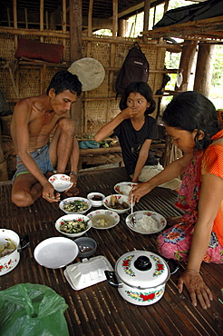 Cambodia family eating meal, kampong cham