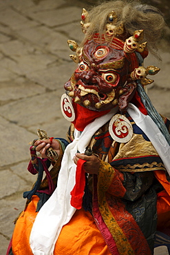 A solitary mask dancer appears wearing a frightening mask and silk brocade. they circle the courtyard with sprightly leaps. called protectors of faith, or dharmapdla, the origins of figures like these can be traced back to the pre-aryan peoples of india. originally known as yaksas (literally, a wondrous thing), they were tree spirits, who were accepted by the buddhists as defenders of the faith. in nepal and tibet, as in india, local deities were converted into protectors. a devotee of an alien sect devised a means to humiliate the buddha and his disciples. the buddha discovered it and succeeded in converting him to his teaching. due to lack of wisdom, the buddha remarked, some could not realize the goodness of his disciples and he compared the ignorant to the blind and the wise to those who have eyes.nobody is condemned in buddhism, for greatness is latent even in the seemingly lowliest just as lotuses spring from muddy ponds. -the dhammapada. solu khumbu, nepal