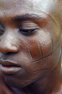 Yaruba with tatoo knifed on cheek, nigeria, afric