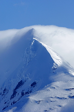 Snow and cloud covered mountain, south georgia