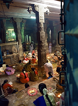 Worshippers at a shrine inside the Sri Meenakshi Temple, Madurai, Tamil Nadu state, India, Asia