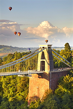 Clifton Suspension Bridge, with hot air balloons in the Bristol Balloon Fiesta in August, Clifton, Bristol, England, United Kingdom, Europe