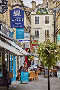 Historic architecture and a street scene in the historic heart of Bath, Somerset, England, United Kingdom, Europe