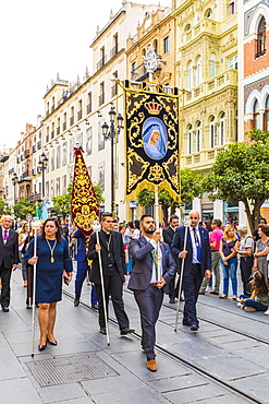 A procession to move the Virgin of Hope of Macarena statue from Seville Cathedral, Seville, Andalucia, Spain, Europe