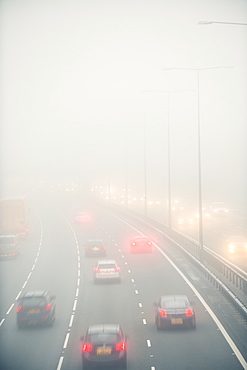 Motorway traffic in thick fog, United Kingdom, Europe