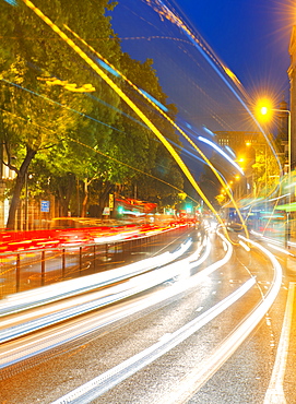 Streams of car headlights at night, London, England, United Kingdom, Europe