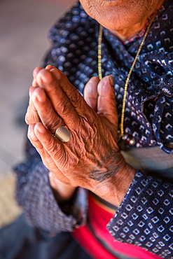 Old woman's hands praying, Bhaktapur, Nepal, Asia