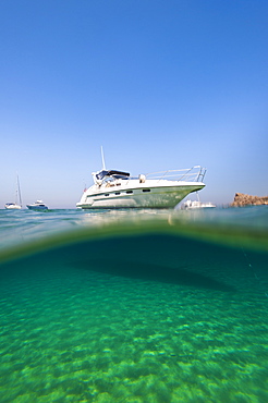 A speedboat moored at San Blas Bay off the island of Gozo near Malta, Mediterranean, Europe