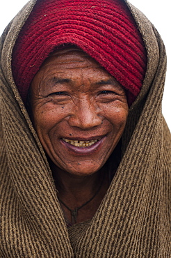 Woolen blankets are used like coats to keep warm in Nepal, Asia