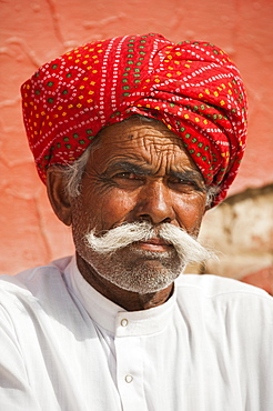 A Rajasthani man wearing a turban and a typically large moustache, Rajasthan, India, Asia