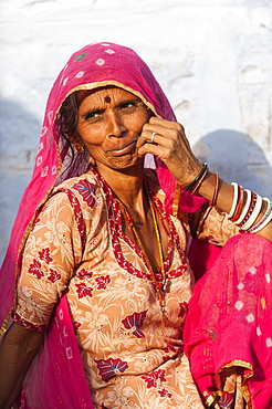 A Rajasthani woman wearing a traditional veil called a Ghoonghat, Rajasthan, India, Asia