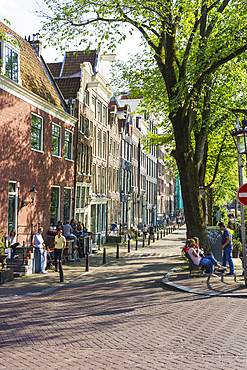 Old gabled buildings by a canal, Amsterdam, North Holland, The Netherlands, Europe