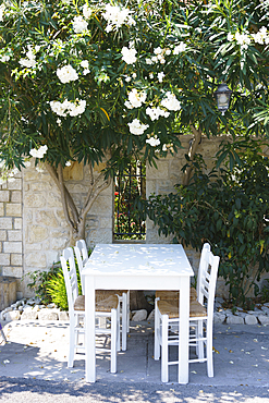 Taverna table and chairs, Gaios, Paxos, Ionian Islands, Greek Islands, Greece, Europe