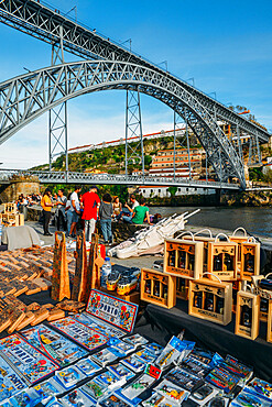 Souvenirs for sale at Cais Ribeira overlooking the Dom Luis I bridge in Porto, UNESCO World Heritage Site, Portugal, Europe