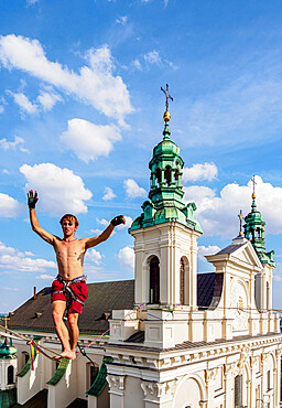 Highlining with Cathedral in the background, Urban Highline Festival, Lublin, Lublin Voivodeship, Poland, Europe