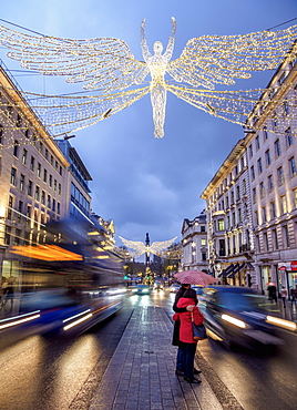 Regent Street with Christmas illuminations at twilight, London, England, United Kingdom, Europe