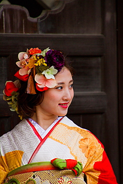 Japanese woman dressed in traditional kimono, Kyoto, Japan, Asia