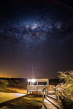 The Milky Way over a viewing platform at the Hlosi Game Lodge in the Amakhala Game Reserve in the Eastern Cape, South Africa, Africa