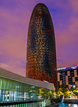 Disseny Hub Barcelona and skyscraper Torre Agbar at sunset, architect Jean Nouvel, Barcelona, Catalonia, Spain, Europe