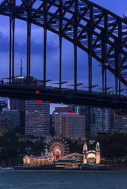 Sydney Harbour Bridge with Luna Park amusement park on North shore, Sydney, New South Wales, Australia, Pacific