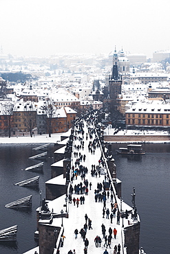 Charles Bridge over the Vltava River in winter, UNESCO World Heritage Site, Prague, Czech Republic, Europe