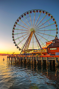 Seattle's Great Wheel on Pier 57 at golden hour, Seattle, Washington State, United States of America, North America