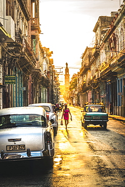 American and Russian vintage cars at sunset, La Habana (Havana), Cuba, West Indies, Caribbean, Central America