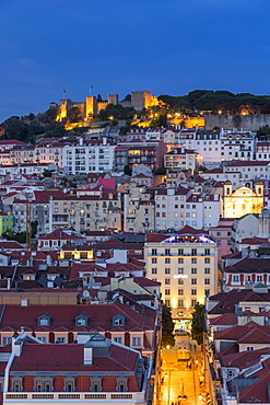 View from the Santa Justa Lookout over the city centre and the Sao Jorge Castle at dusk, Lisbon, Portgual, Europe