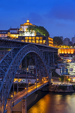 Dom Luis I Bridge and Serra do Pilar Monastery at dusk, Porto, Portugal, Europe