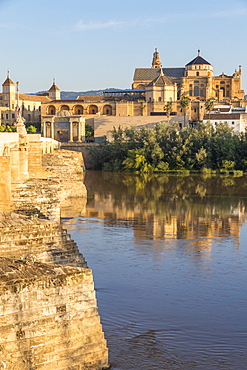 The Mosque-Cathedral (Great Mosque of Cordoba) (Mezquita) and the Roman bridge at first sunlight, UNESCO World Heritage Site, Cordoba, Andalusia, Spain, Europe