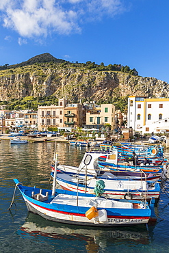 Colourful boats anchoring at the port of Mondello with view to Mount Gallo in the background, Palermo, Sicily, Italy, Europe