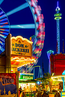 The funfair Hamburger Dom at dusk, Hamburg, Germany, Europe