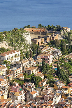 View over Taormina and the ancient Greek Theatre, Taormina, Sicily, Italy, Europe